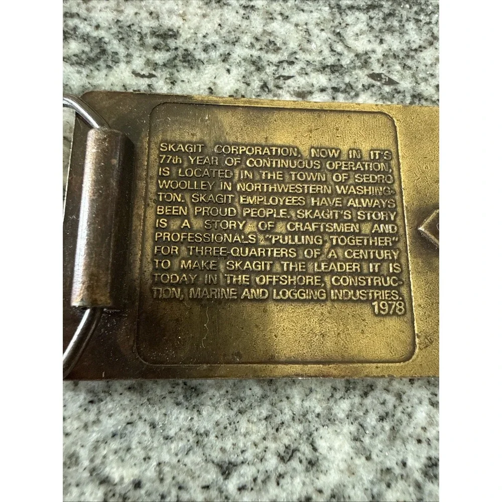 brass‎ belt buckle logos Bendix Corporation and Skagit Car Brake Equipment 1978